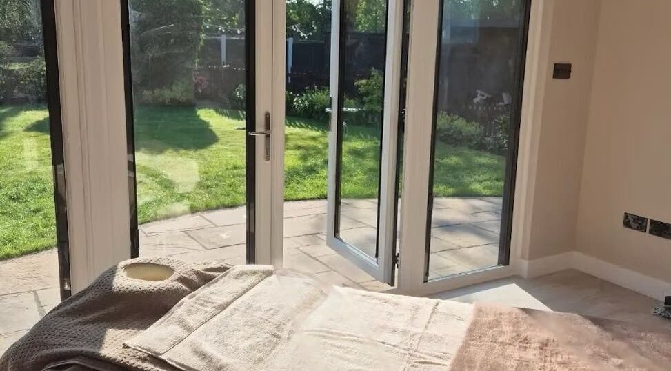 Relaxing spa room with garden view at Serene Beauty, Northwich, England, GB.