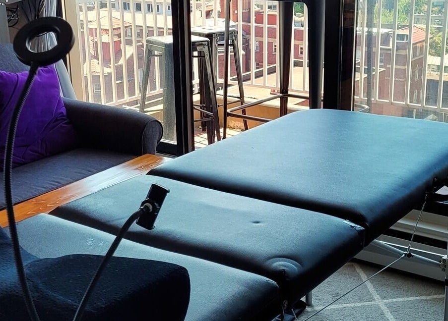 Relaxing mobile lash station setup at Eye Love Lashes YVR in Vancouver, British Columbia, CA with cityscape view.