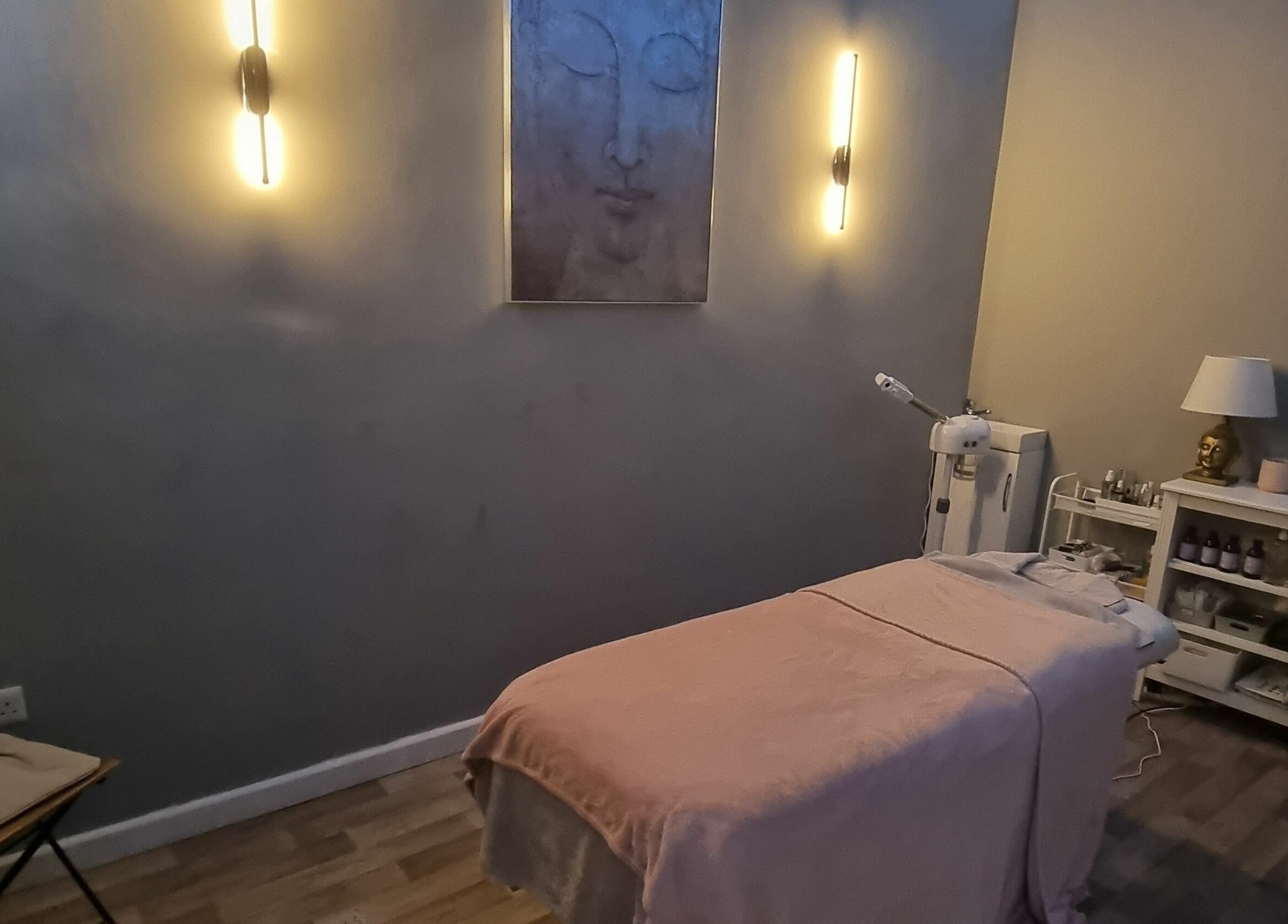 Serene treatment room at Zen Lashes And Beauty, Nottingham, England, GB with soft lighting and calming decor.