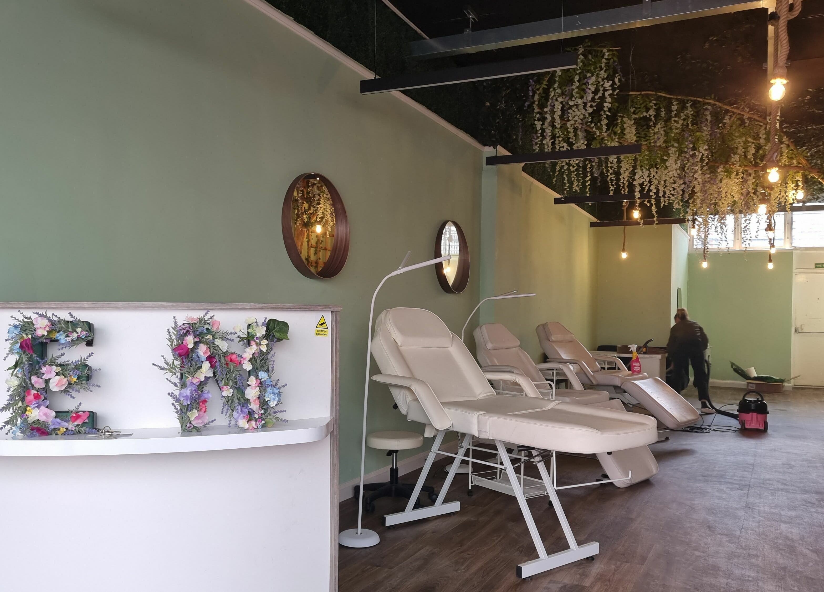 Interior of Zen Lashes And Beauty in Nottingham, England, GB. Features reclining chairs and floral decor.