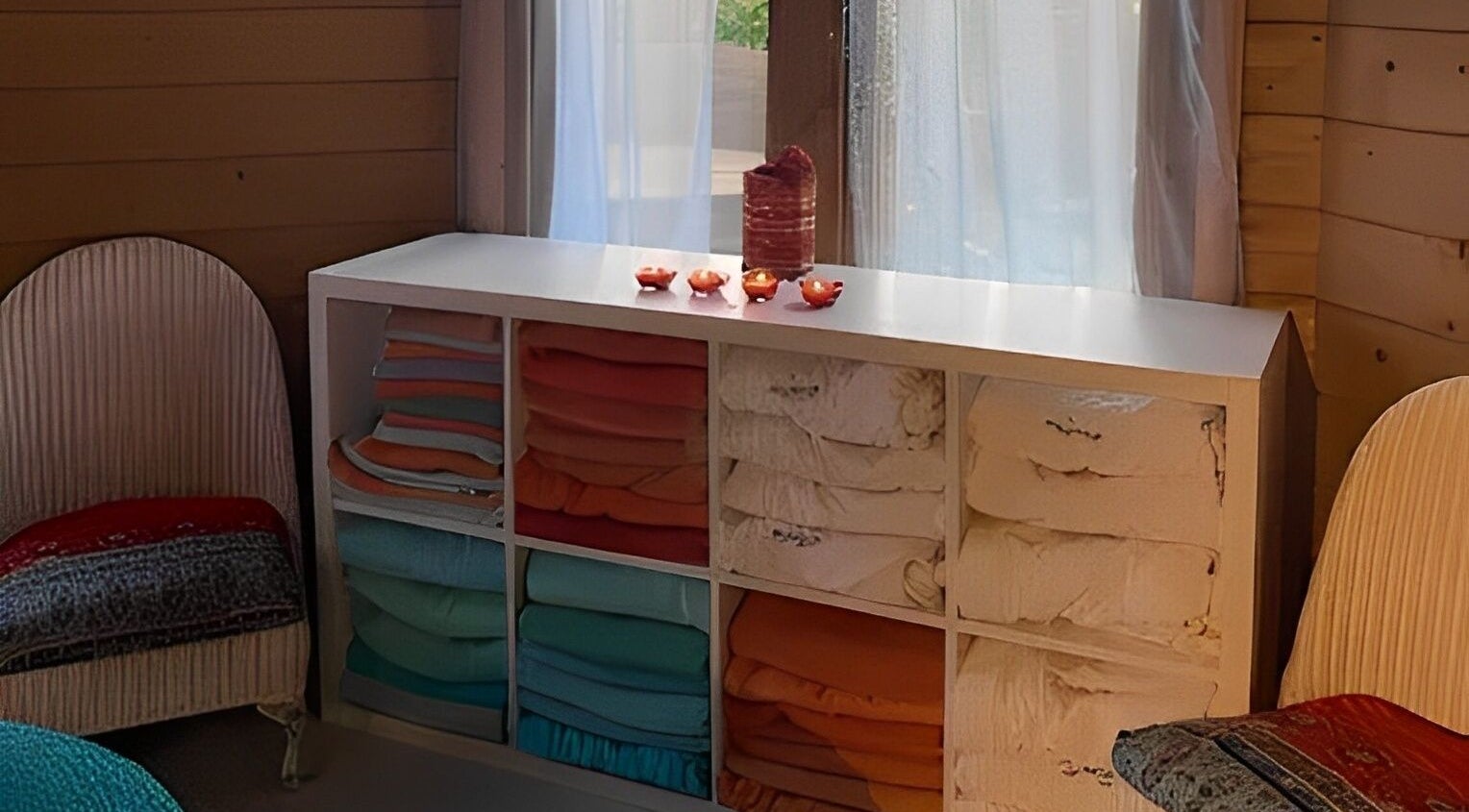 Restful spa corner with folded towels at Touching Lives, Hampton, England, GB.