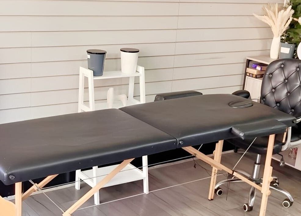 Massage table at Desired Beauty, St Helens, England, GB. Elegant, calming space for ultimate relaxation.