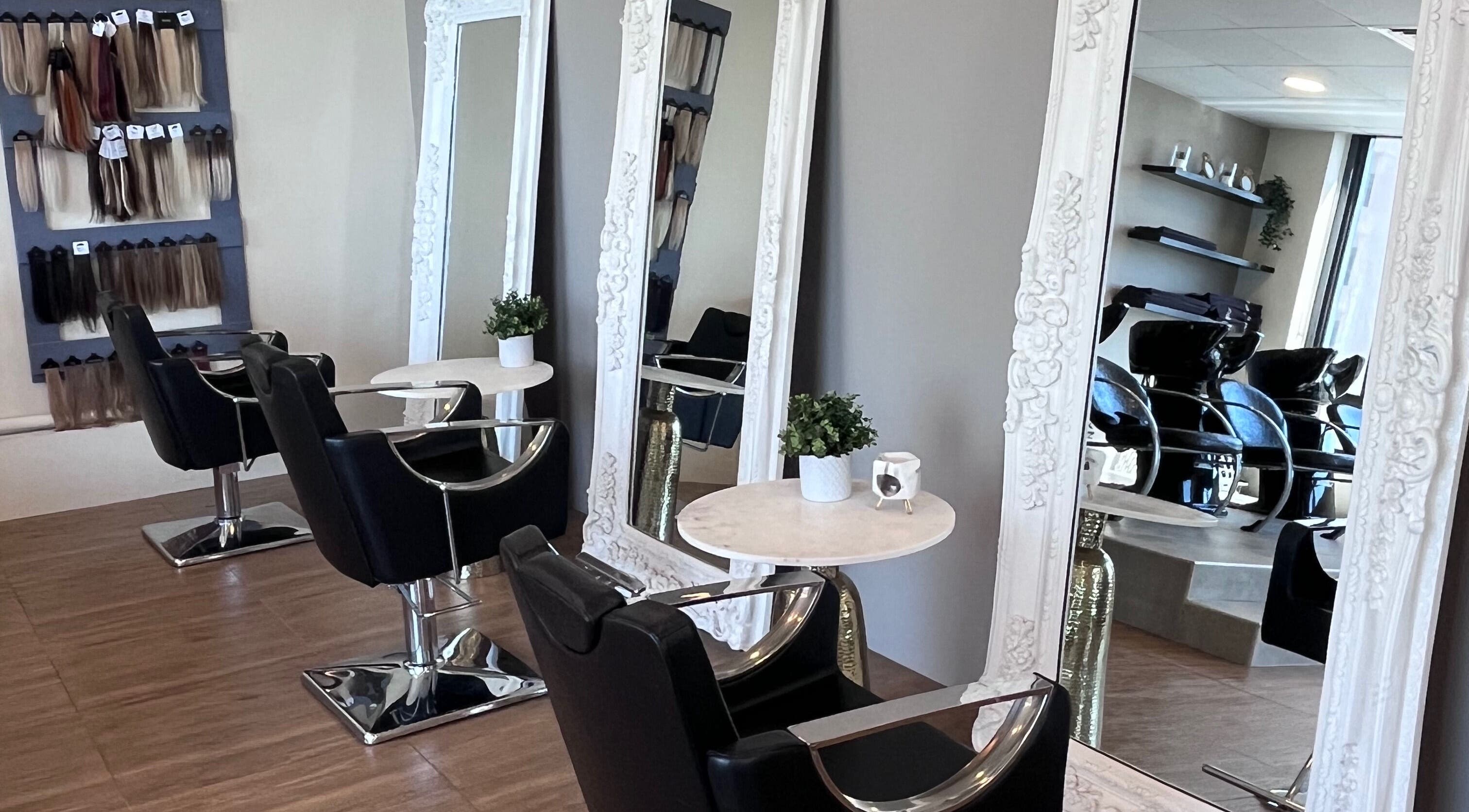 Chic salon chairs and ornate mirrors at The Northern Quarter Hair and Beauty, Dubai, AE.