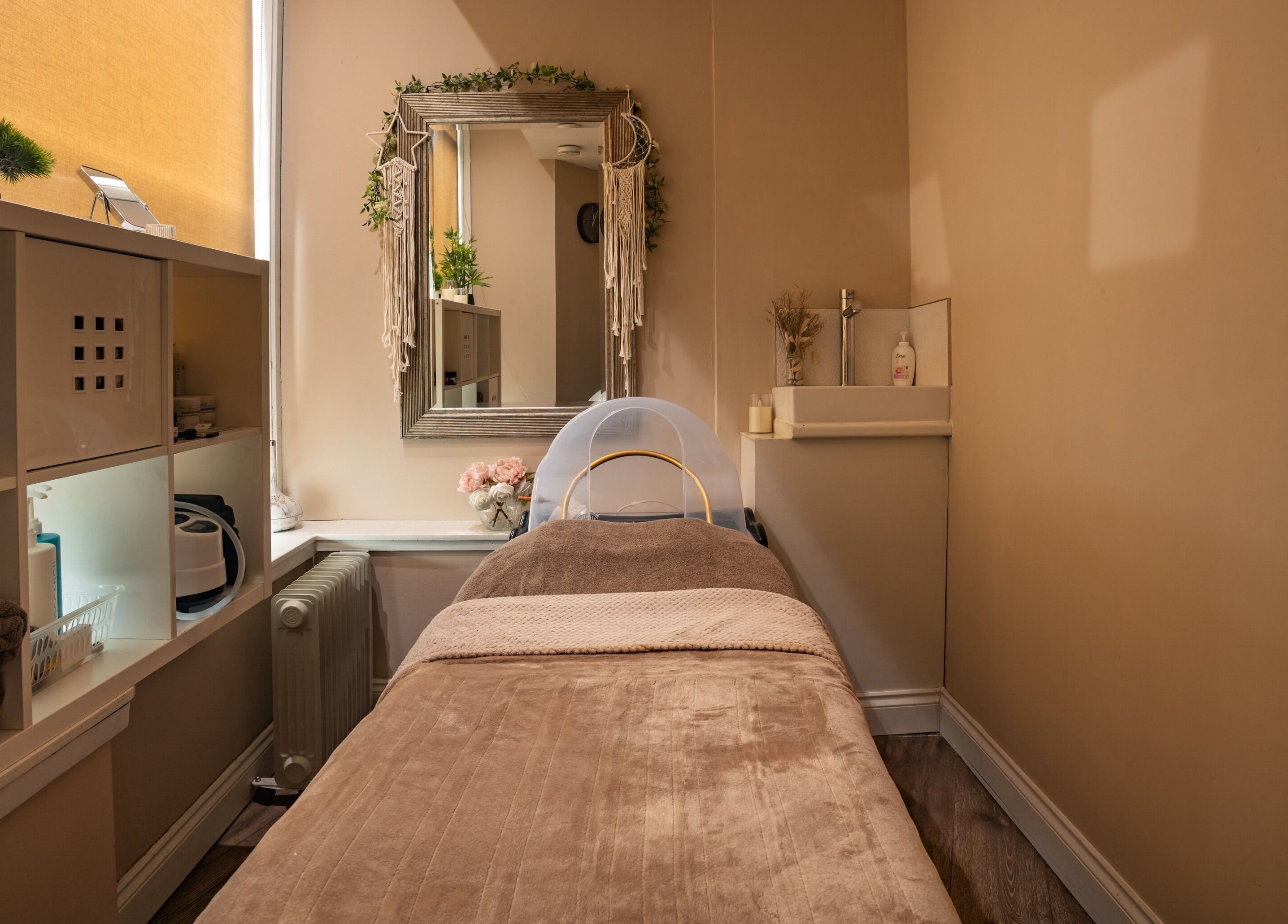 Cozy massage room at Salon at No.1, Glasgow, Scotland, GB with warm lighting and soft décor.