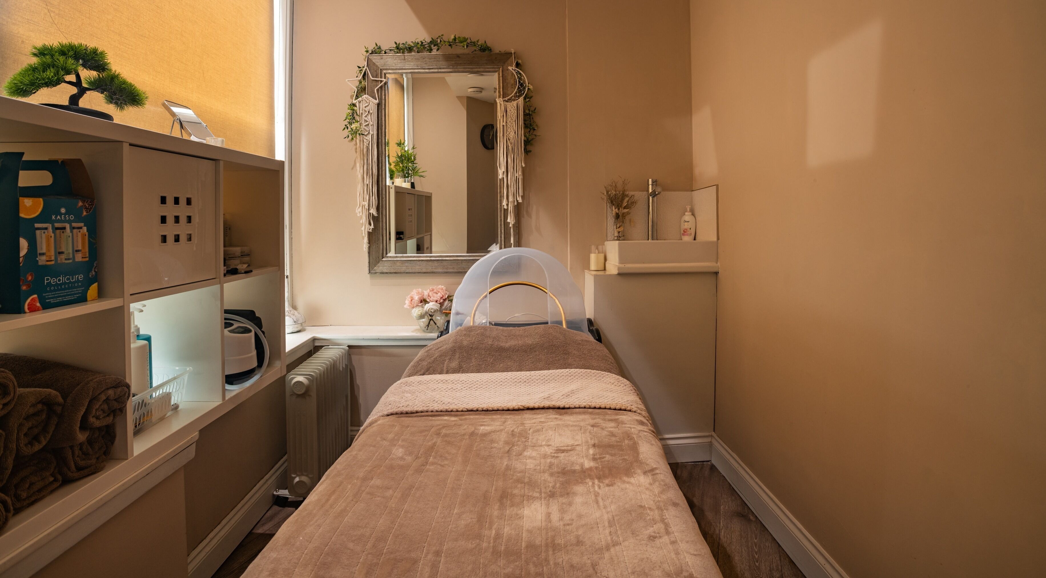 Cozy massage room at Salon at No.1, Glasgow, Scotland, GB with warm lighting and soft décor.