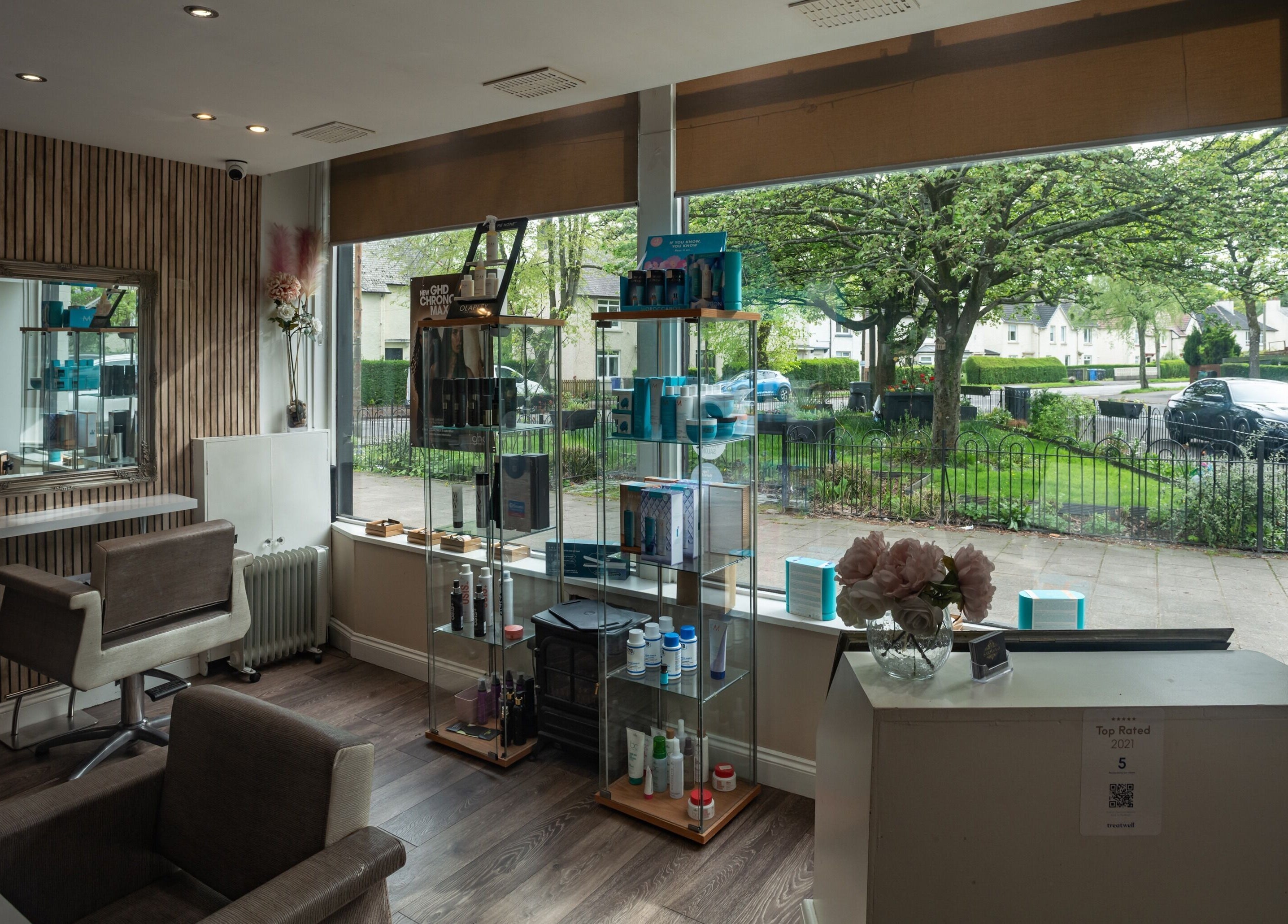 Interior of Salon at No.1, Glasgow, Scotland, GB, featuring modern decor and a tranquil hairdressing station.