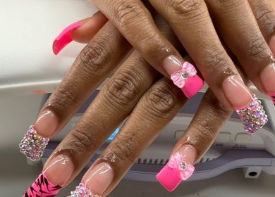 Vibrant pink and crystal nail design at Too Prissy Beauty, Concord, North Carolina, US.
