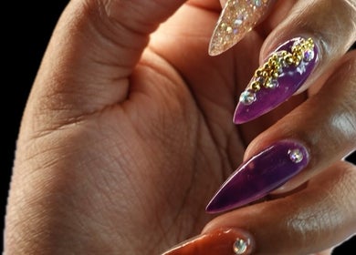 Stylish, embellished nails at Too Prissy Beauty, Concord, North Carolina, US. Perfect for a chic look.