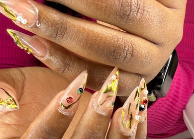 Intricate nail art with gold accents at Too Prissy Beauty, Concord, North Carolina, US.