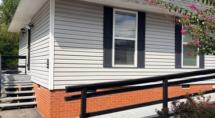 Too Prissy Beauty's elegant exterior with fresh flowers in Concord, North Carolina, US.