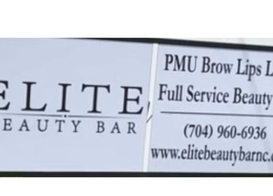 Sign for Elite Beauty Bar in Concord, North Carolina, near Too Prissy Beauty venue.