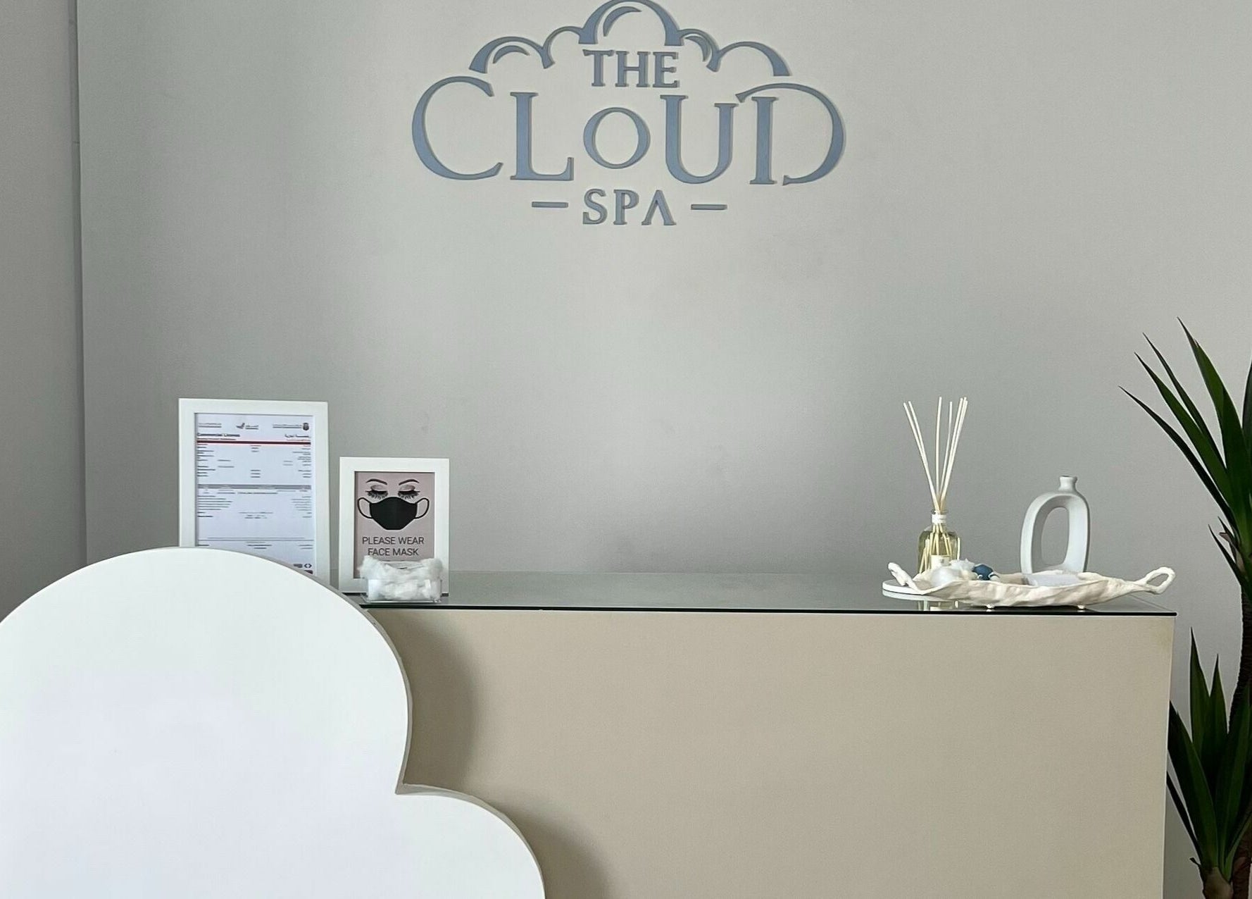 Elegant reception area at The Cloud Spa in Abu Dhabi, AE, featuring modern decor and relaxing ambiance.