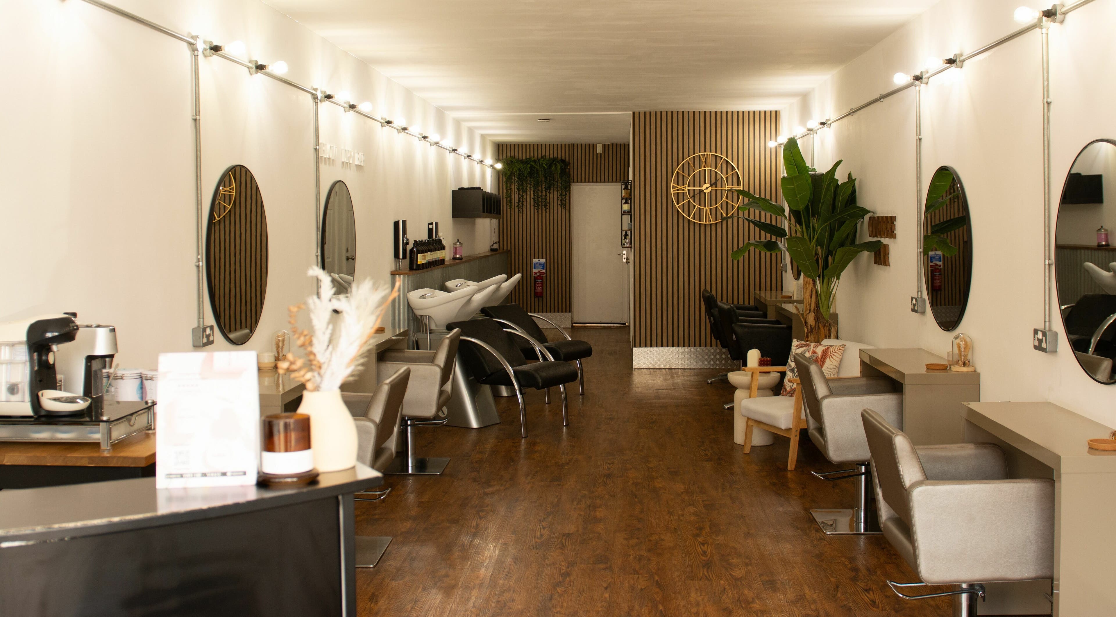 Explore Makeover Salon in Derby, England, GB featuring chic decor and modern hair stations.
