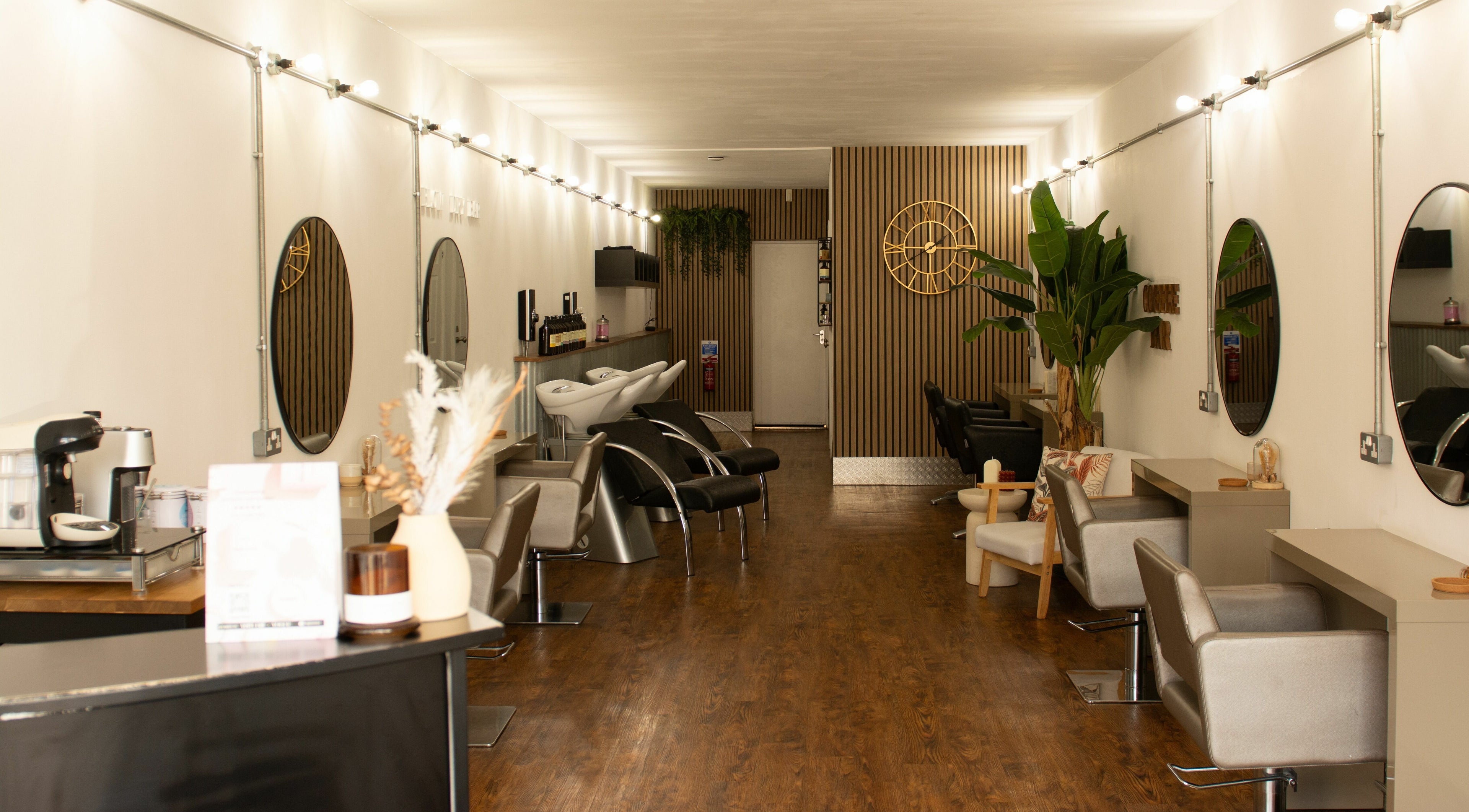 Explore Makeover Salon in Derby, England, GB featuring chic decor and modern hair stations.