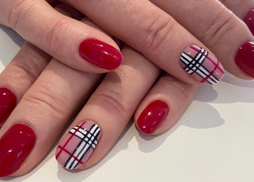 Elegant plaid nail art at Luxify Laser, Cape Town, Western Cape, ZA, showcasing trendy red designs.