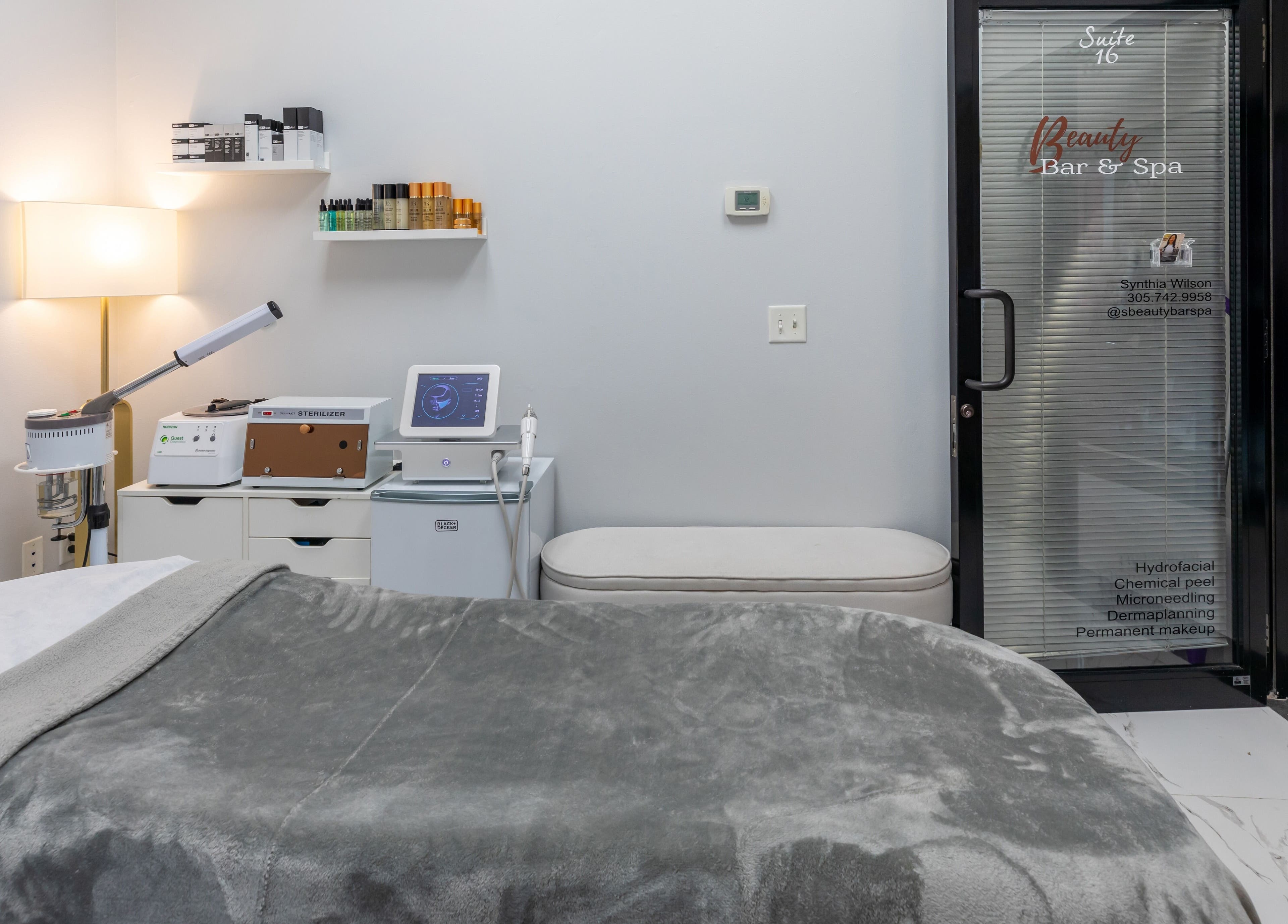 Relaxing spa room at Beauty Bar & Spa in Miramar, Florida, US, showcasing modern equipment and decor.