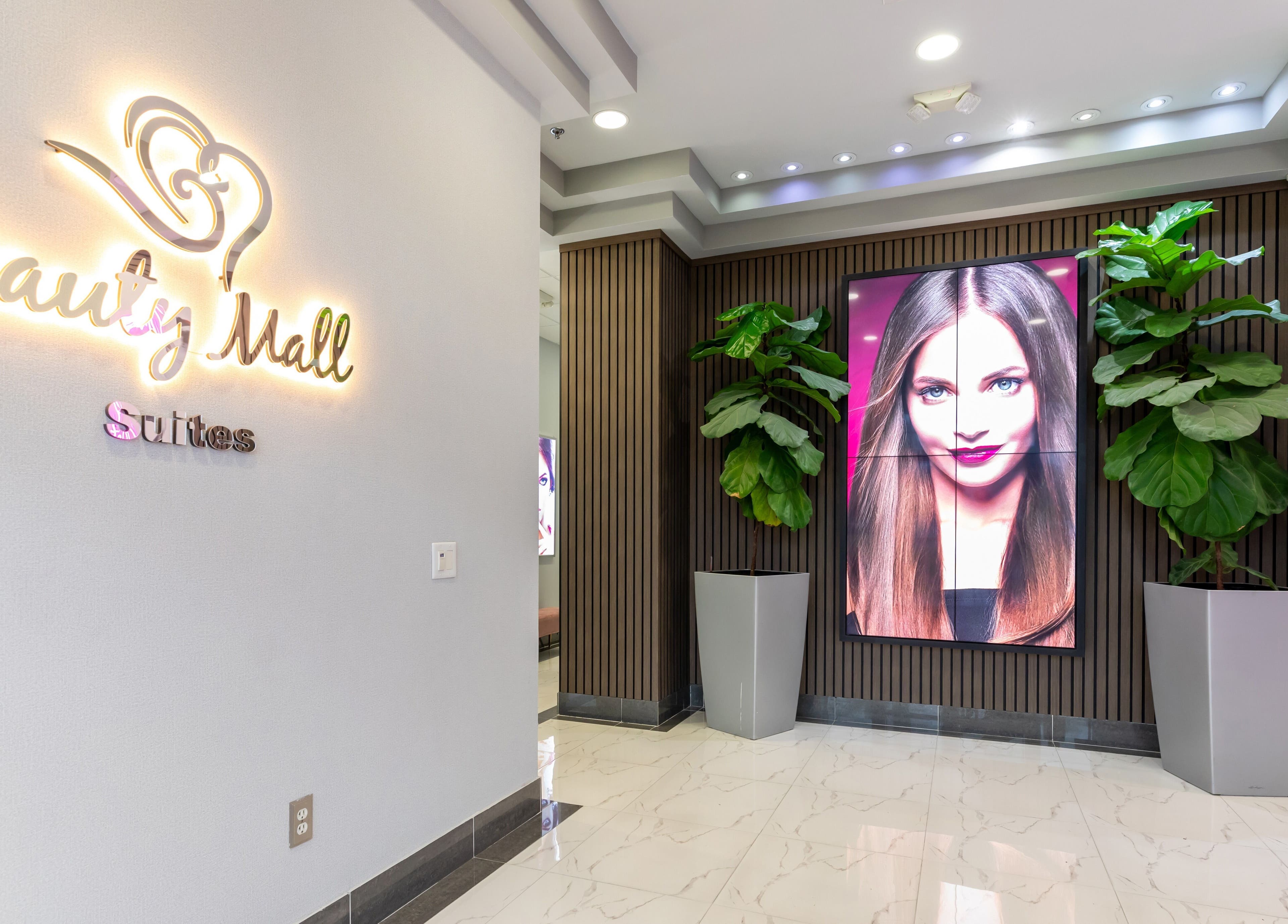Elegant entrance of Beauty Bar & Spa in Miramar, Florida, US with illuminated signage and stylish decor.
