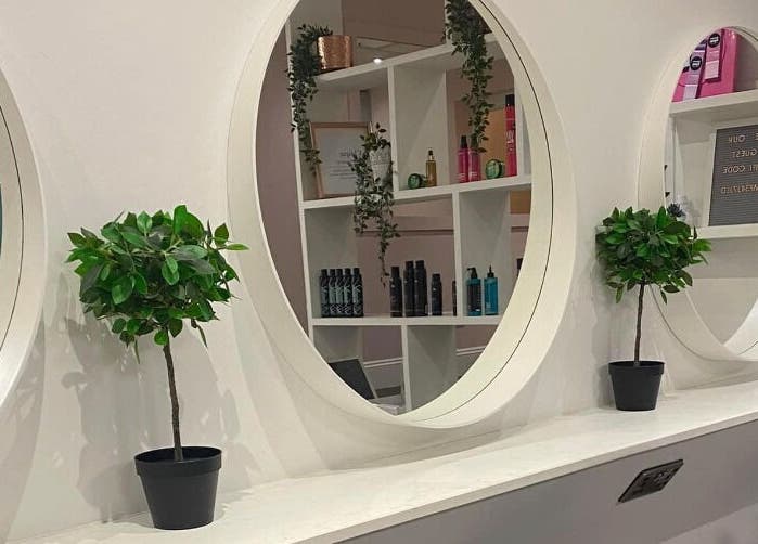 Chique Hair & Beauty interior with stylish mirrors and plants, Carlisle, England, GB.