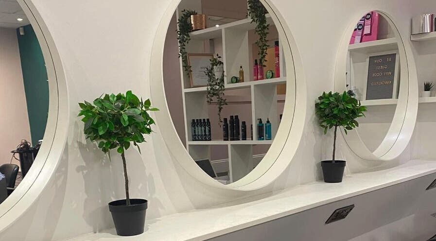 Chique Hair & Beauty interior with stylish mirrors and plants, Carlisle, England, GB.