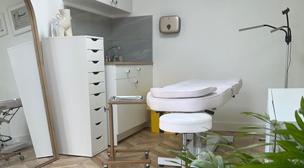 Serene treatment room at Arched And Dangerous Aesthetics, Dinas Powys, Wales, GB with modern decor.