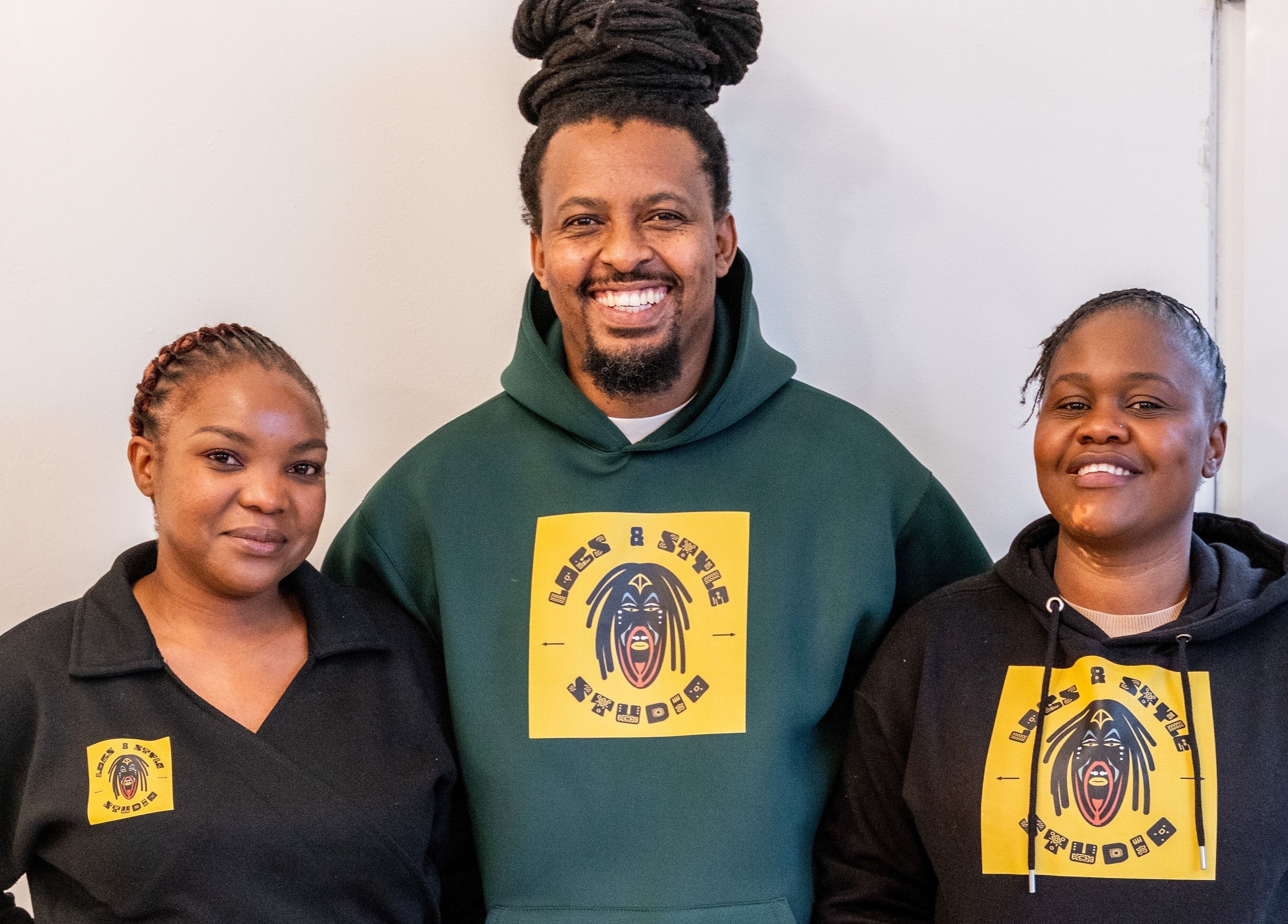 Friendly team at Locks & Style Studio, London, England, GB, showcasing warm hospitality and professionalism.