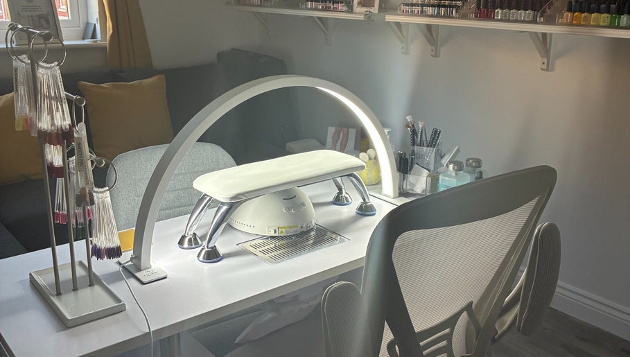 Modern nail station at Bumble Bee Bee-auty, Dukinfield, England, GB with tools and cozy seating.