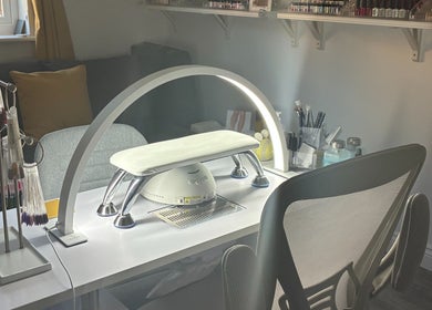 Modern nail station at Bumble Bee Bee-auty, Dukinfield, England, GB with tools and cozy seating.