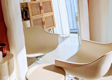 Cozy salon chairs at Lia Hanson Hair, Melbourne, Victoria, AU showcasing elegant interior details.