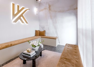 Sophisticated waiting area at Knockout Brows, Belmont, Victoria, AU with plush seating and modern decor.