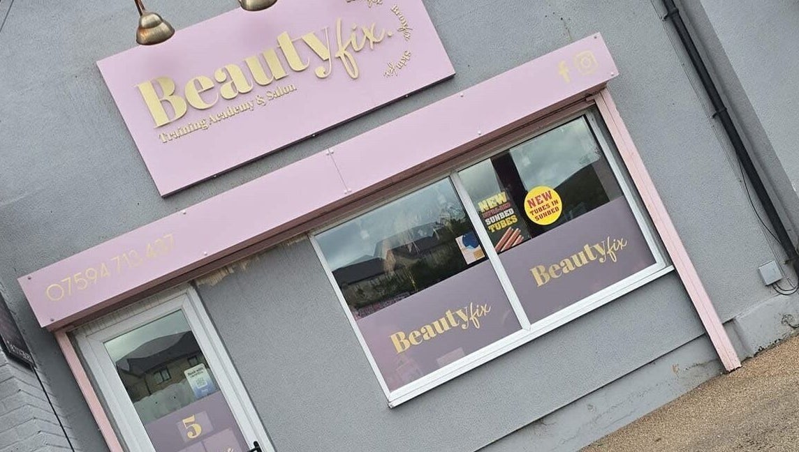 Jess @ Beautyfix shopfront, pink signage in Sheffield, England, GB showcasing beauty and wellness services.