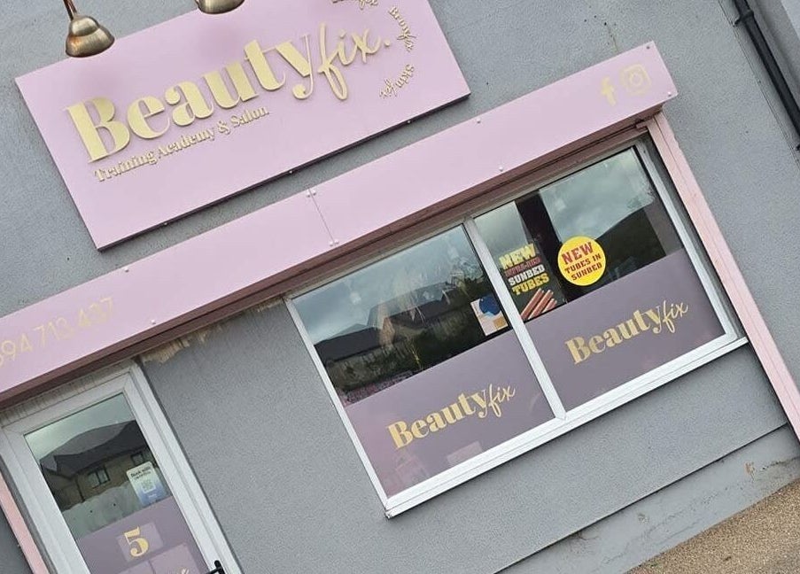 Jess @ Beautyfix shopfront, pink signage in Sheffield, England, GB showcasing beauty and wellness services.