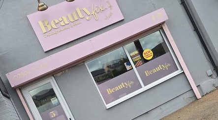 Jess @ Beautyfix shopfront, pink signage in Sheffield, England, GB showcasing beauty and wellness services.