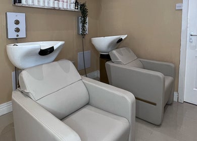 Comfortable wash stations at Olivia Wilson Hairdressing in Falkirk, Scotland, GB offer a serene experience.