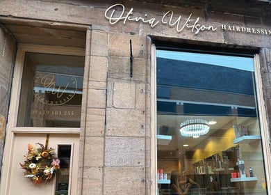 Front view of Olivia Wilson Hairdressing in Falkirk, Scotland, GB, showcasing elegant decor and inviting atmosphere.