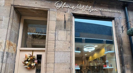 Front view of Olivia Wilson Hairdressing in Falkirk, Scotland, GB, showcasing elegant decor and inviting atmosphere.