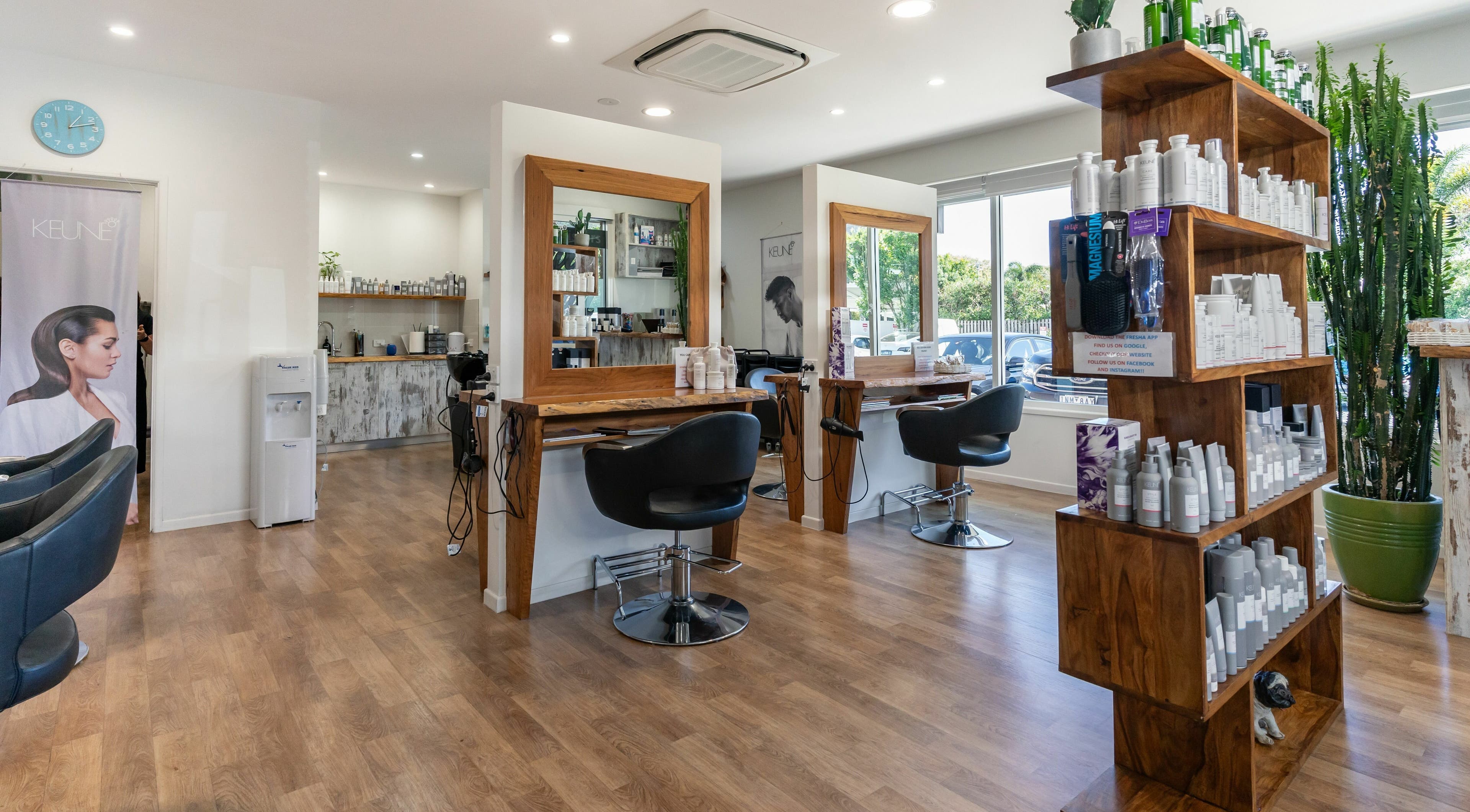 Modern interior of Rock Paper Scissors Hair and Beauty in Mount Coolum, Queensland, AU, showcasing salon stations.