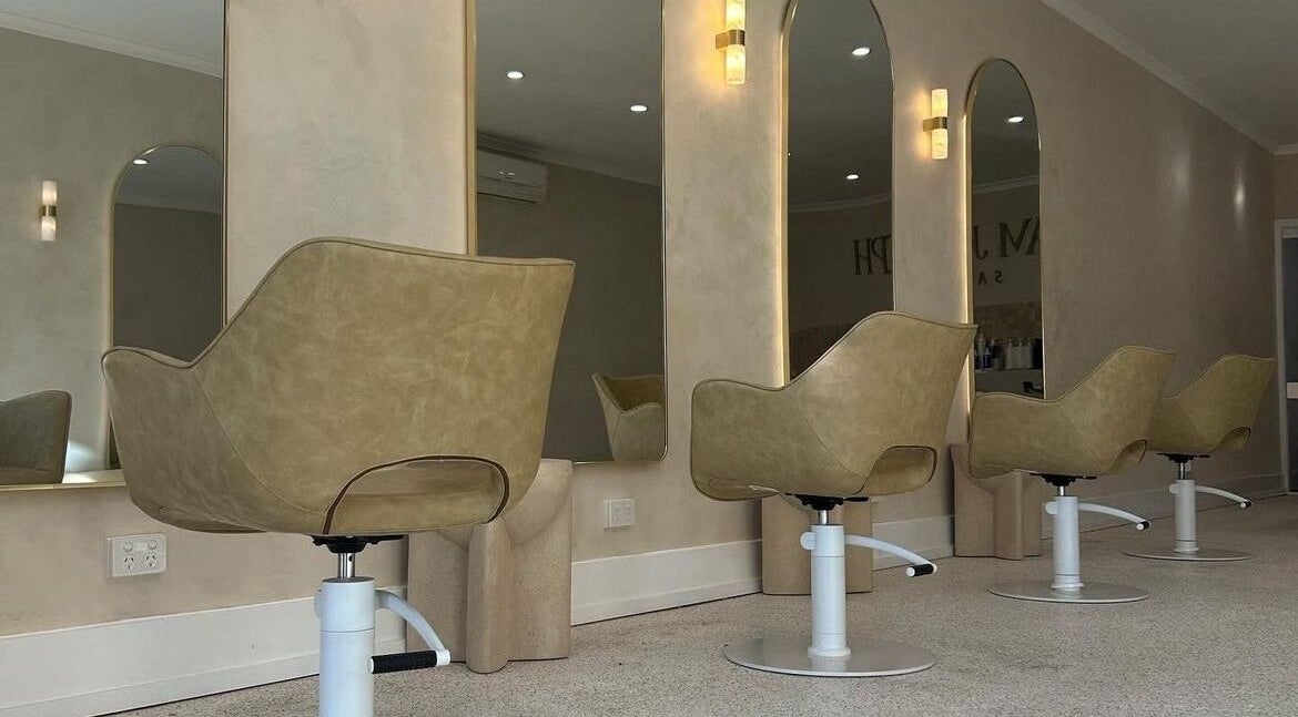 Chic salon chairs lined up at Rebecca, a beauty venue in Melbourne, Victoria, AU.
