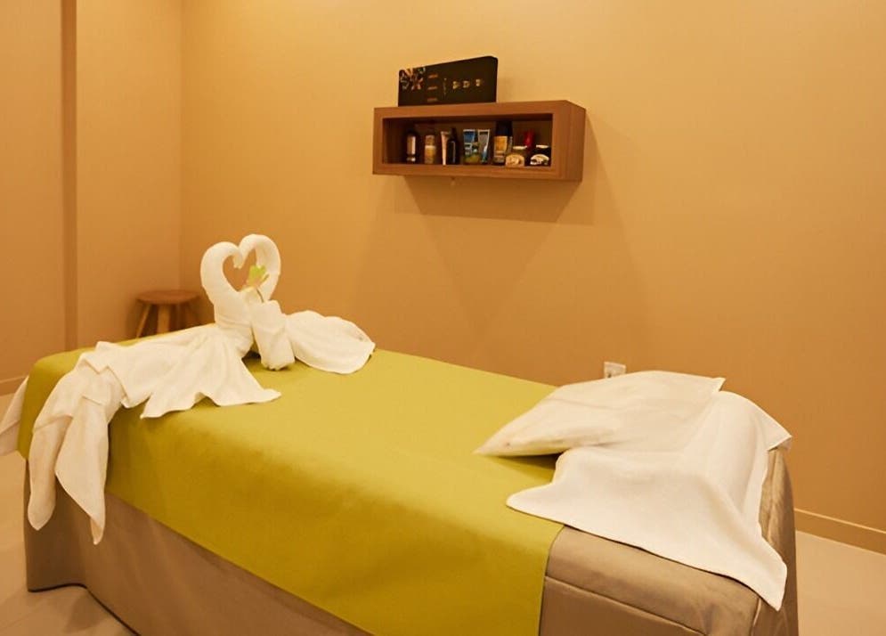 Tranquil massage room at The ZUU Ladies Massage Spa Lounge in Dubai, Dubai, AE with elegant towel decor.
