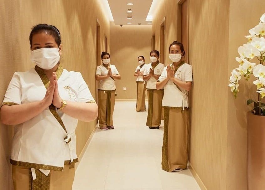 Staff at The ZUU Ladies Massage Spa Lounge in Dubai, Dubai, AE welcomes guests with traditional attire.