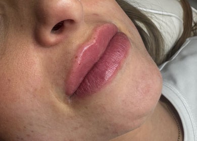 Close-up of enhanced lips at SCULPT. Aesthetics, Hook, Wales, GB, showcasing expert cosmetic results.