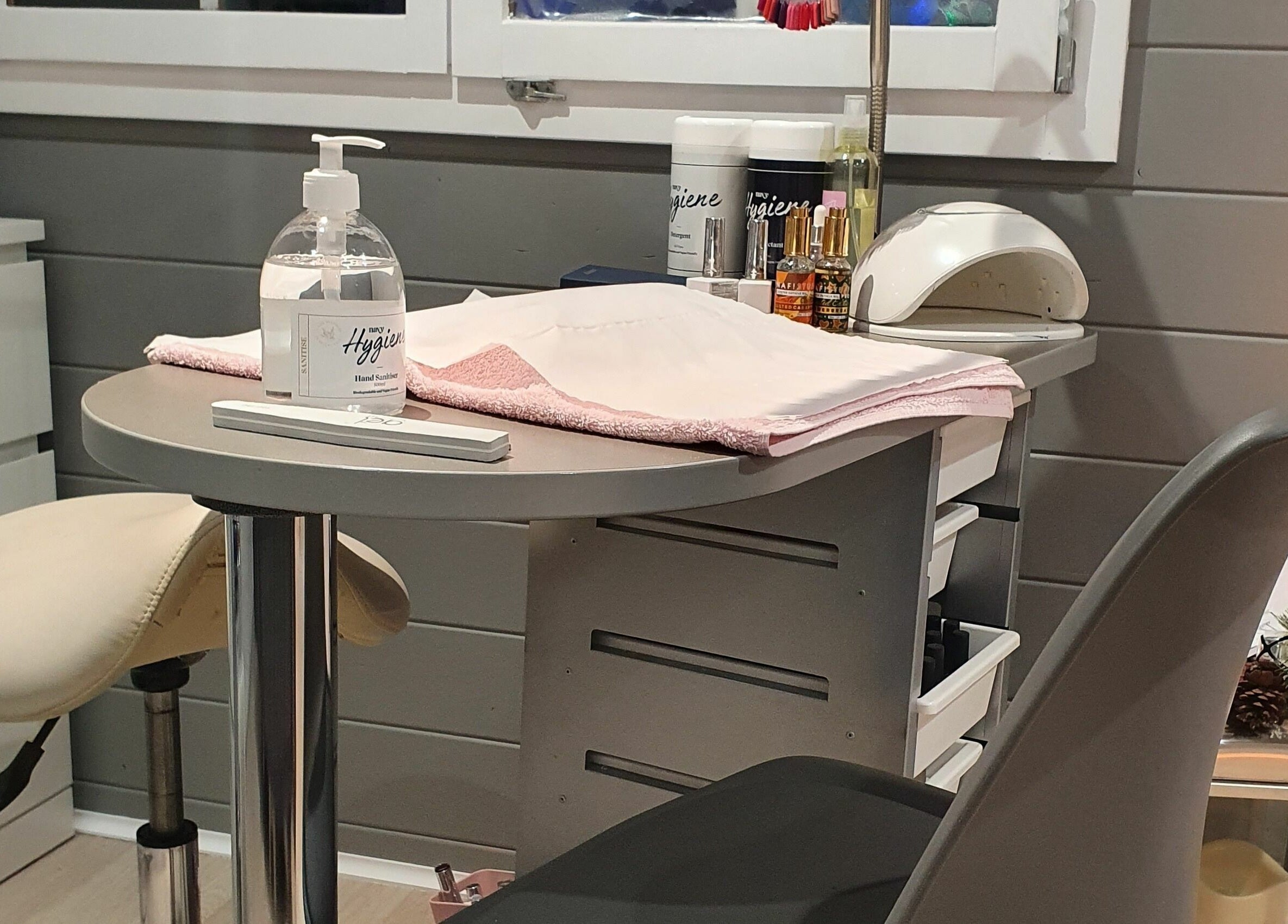 Beautopia's manicure station in BANFF, GB offers a tranquil setting with premium hand sanitizers.