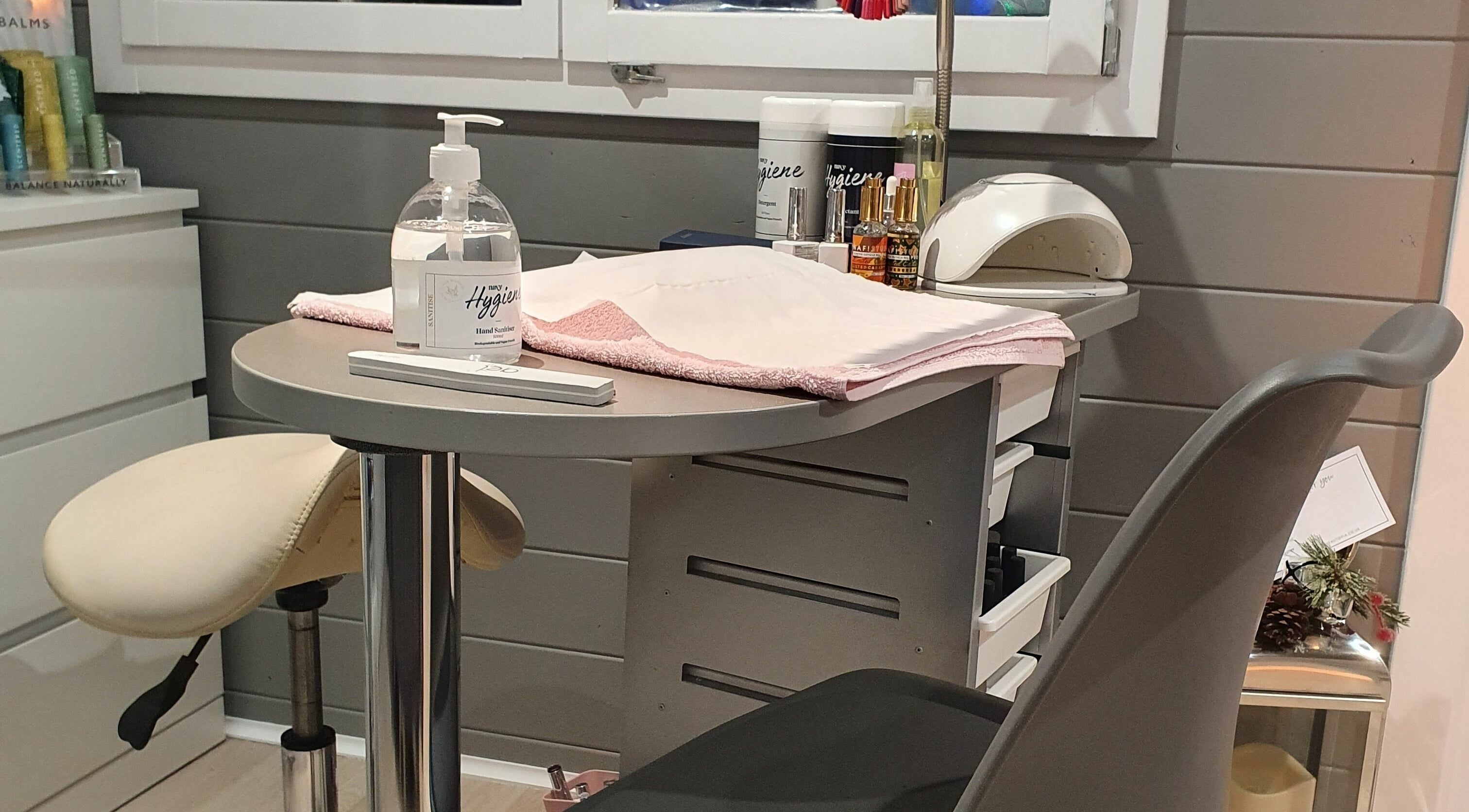 Beautopia's manicure station in BANFF, GB offers a tranquil setting with premium hand sanitizers.