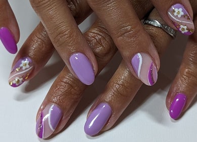 Lavender nail art with floral patterns by Netti's Beauty Bar, Telford, England, GB, showcasing detailed design.