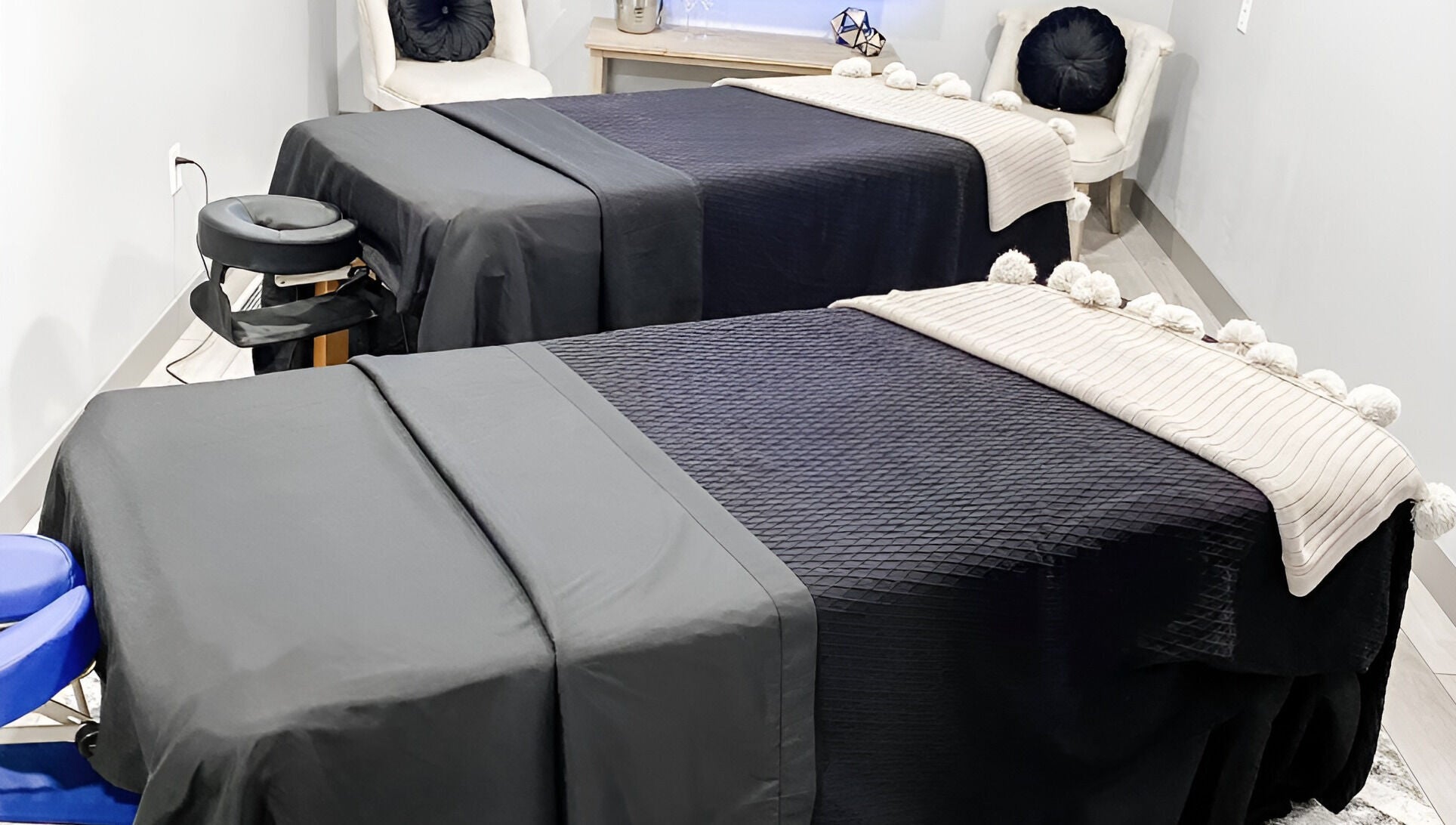 Cozy massage tables in The Valley Day Spa and Salon, Pender, Nebraska, US, ready for relaxation.