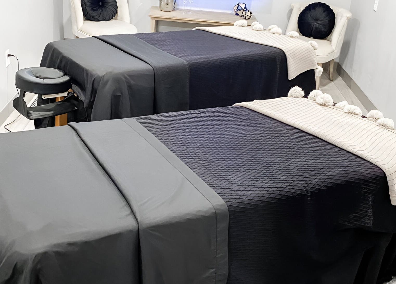 Cozy massage tables in The Valley Day Spa and Salon, Pender, Nebraska, US, ready for relaxation.