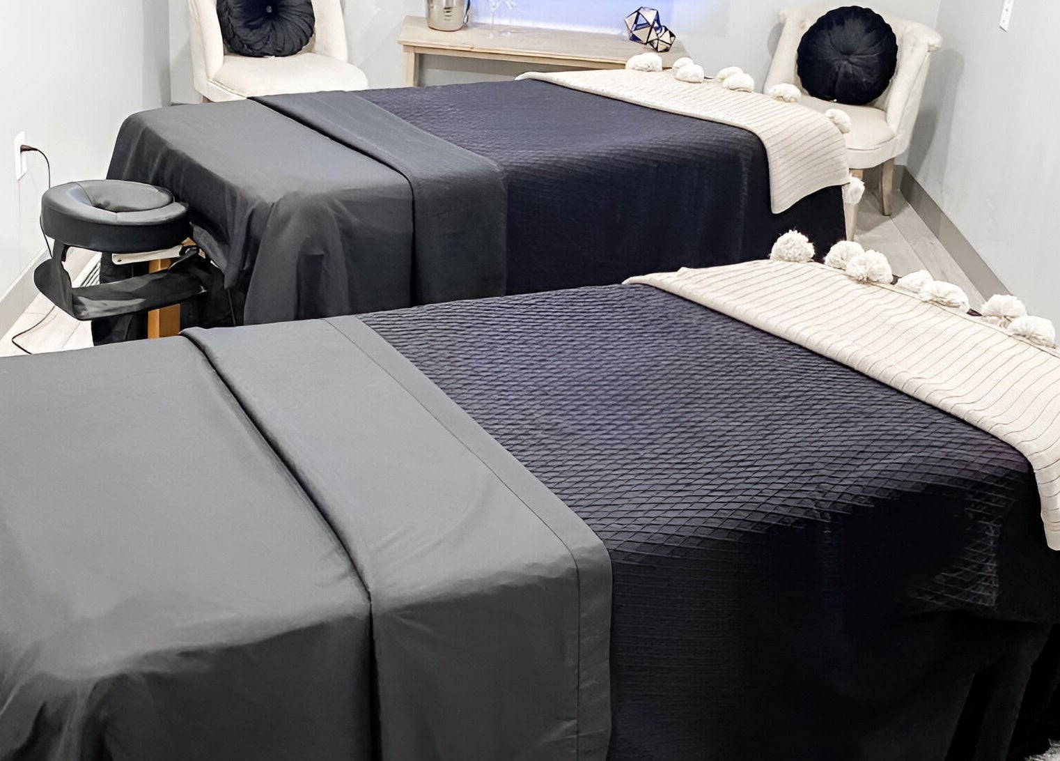 Cozy massage tables in The Valley Day Spa and Salon, Pender, Nebraska, US, ready for relaxation.