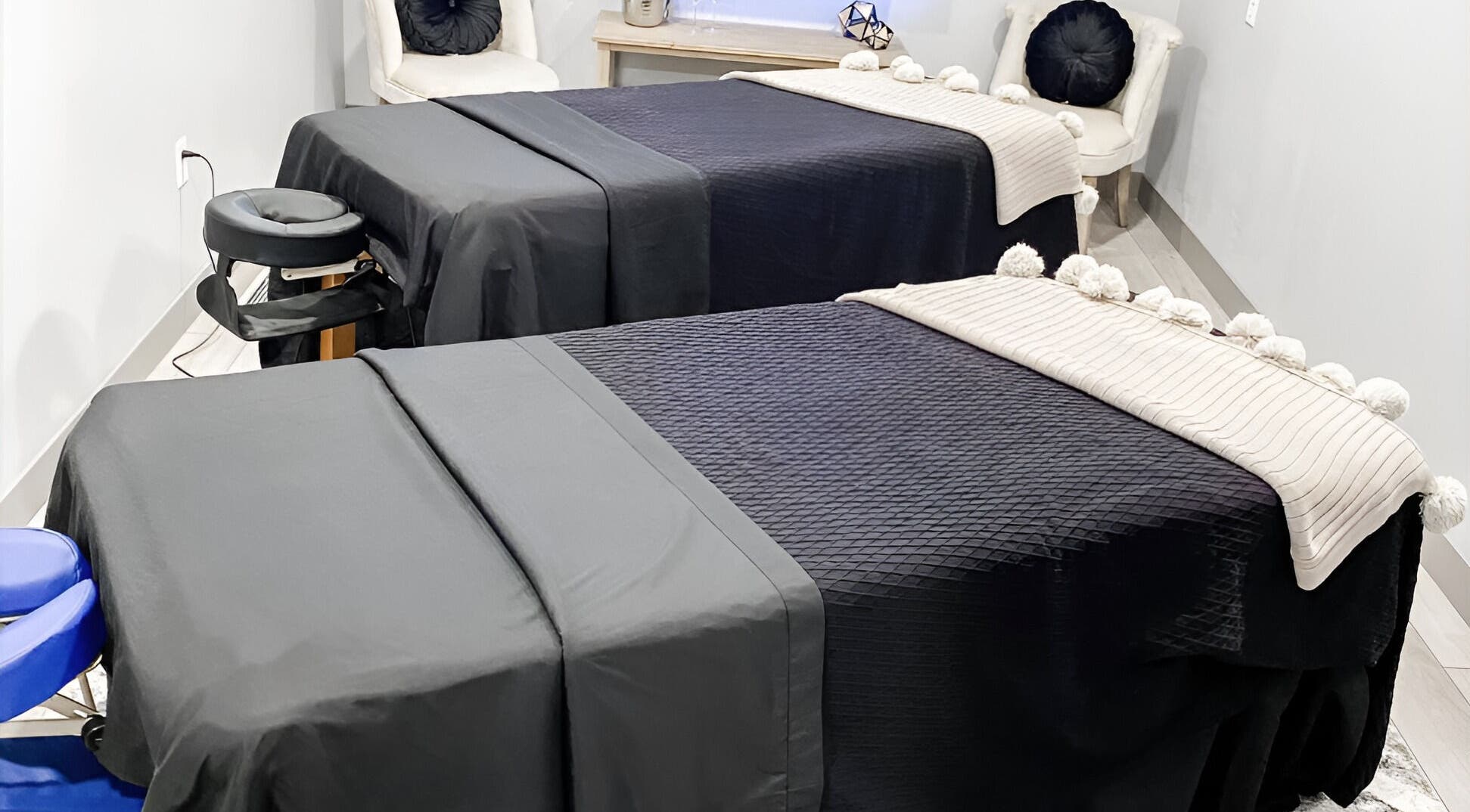 Cozy massage tables in The Valley Day Spa and Salon, Pender, Nebraska, US, ready for relaxation.