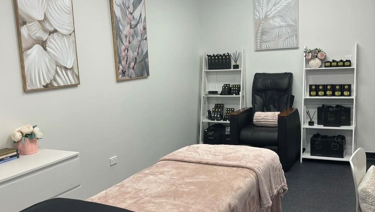 Tranquil spa room at Beauty & Beyond, Whangārei, Northland Region, NZ with massage bed and decor.