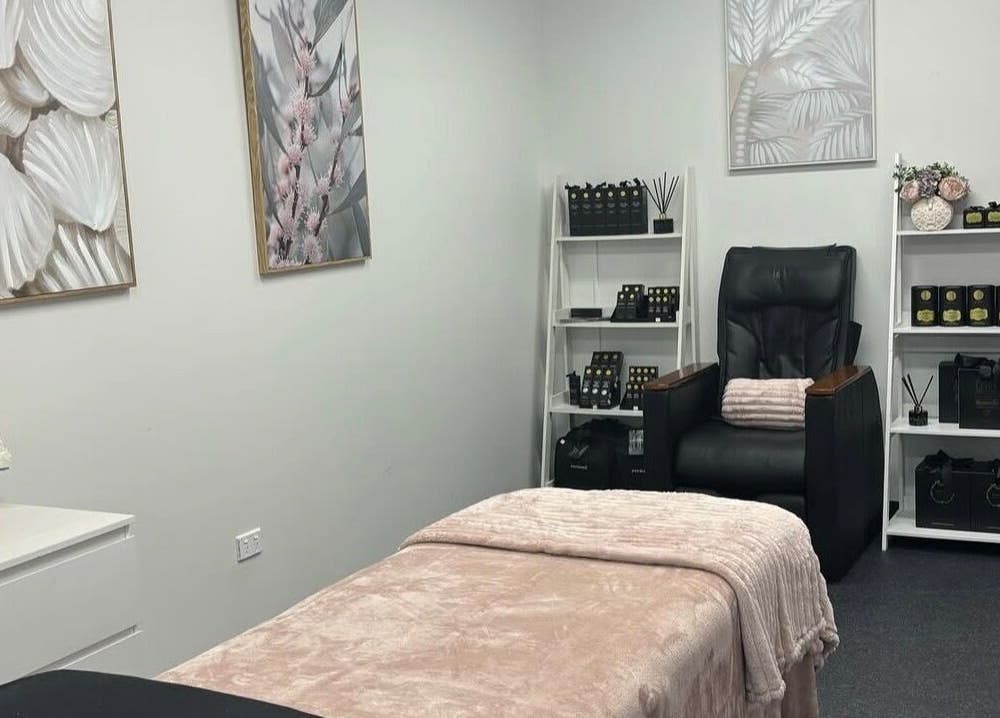 Tranquil spa room at Beauty & Beyond, Whangārei, Northland Region, NZ with massage bed and decor.