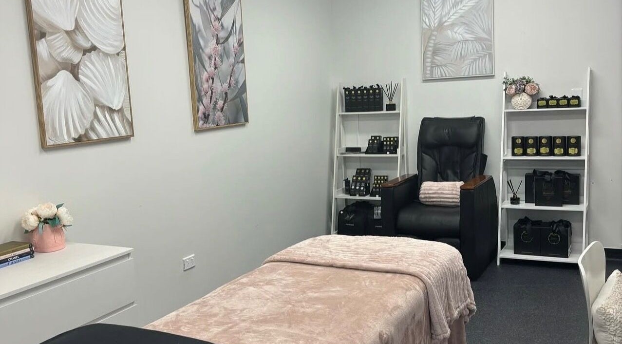 Tranquil spa room at Beauty & Beyond, Whangārei, Northland Region, NZ with massage bed and decor.